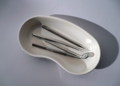 medical bowl containing metal dentistry tools